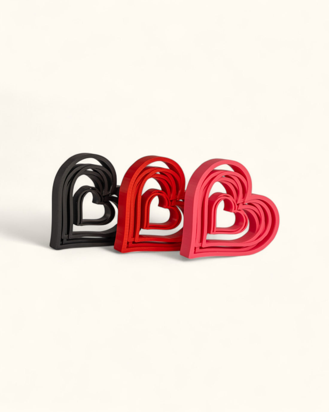 3D printed modern heart décor displayed in layered geometric style as standalone pieces for home or gift use.